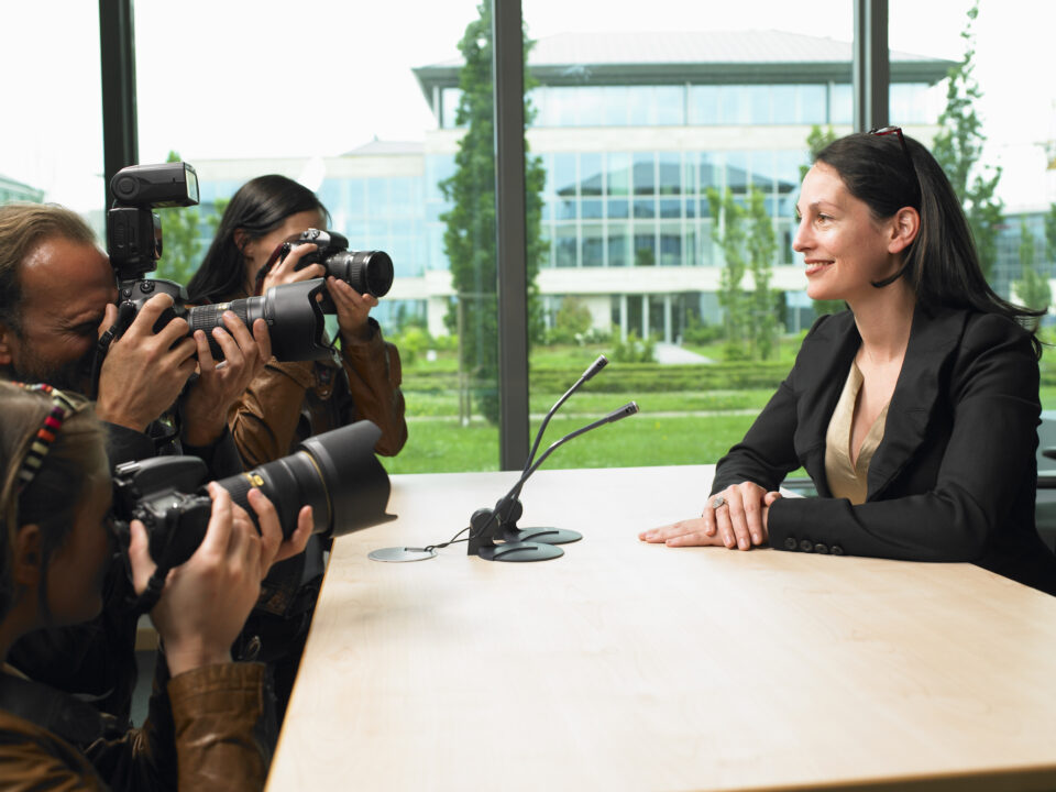 Business woman giving a conference